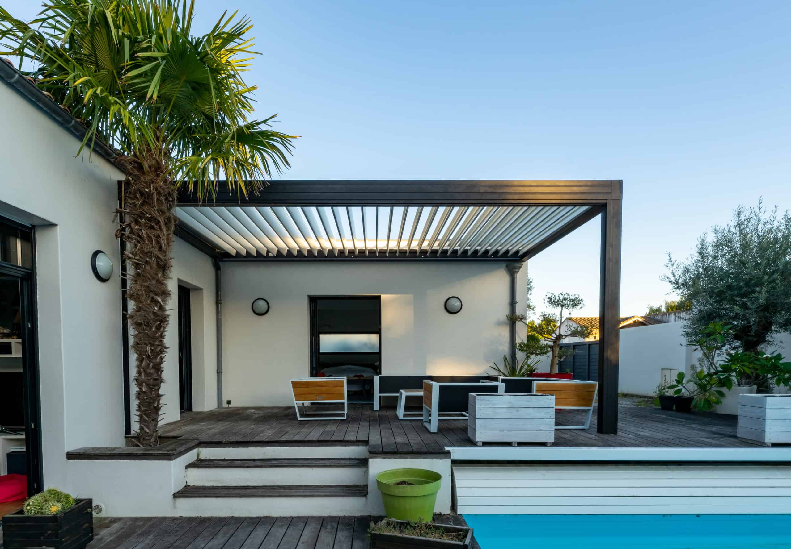 Louvre pergola on a modern single-storey home.